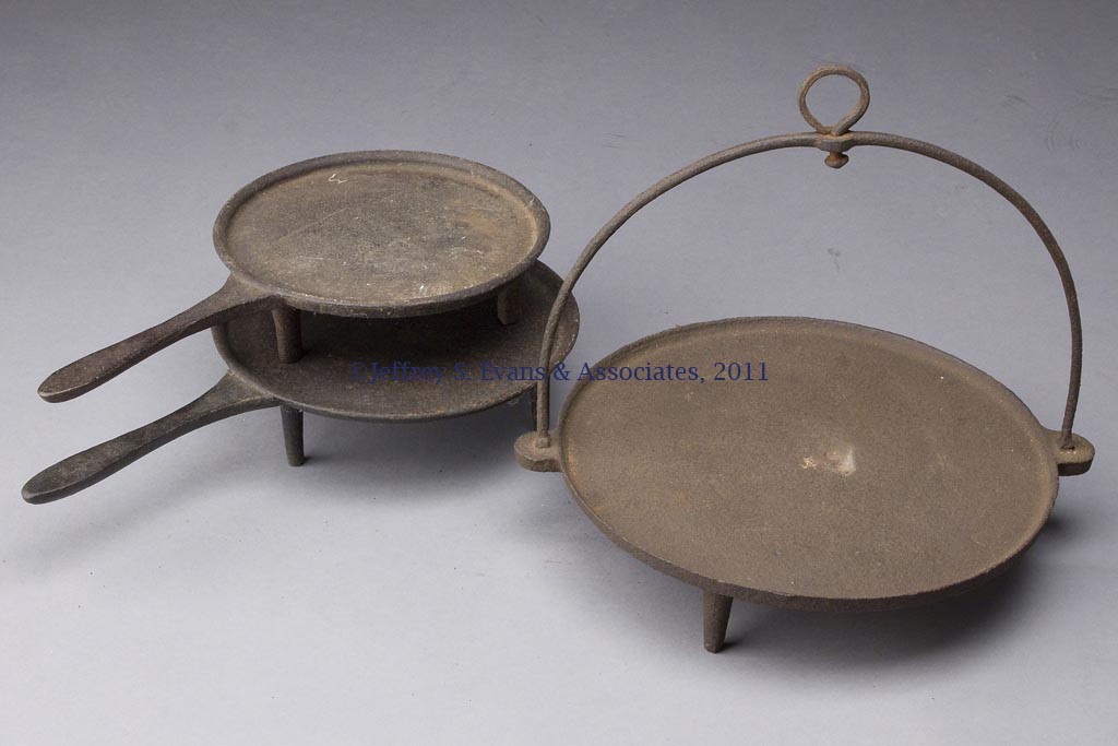 THREE CAST IRON GRIDDLES Jeffrey S. Evans & Associates
