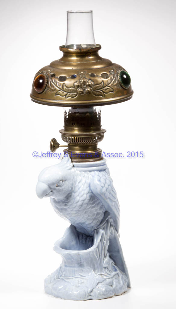 PARROT FIGURAL KEROSENE LAMP Jeffrey S. Evans & Associates