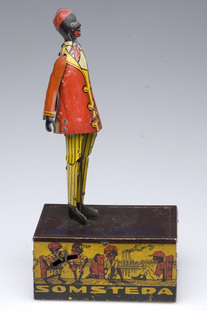 coon jigger wind up toy