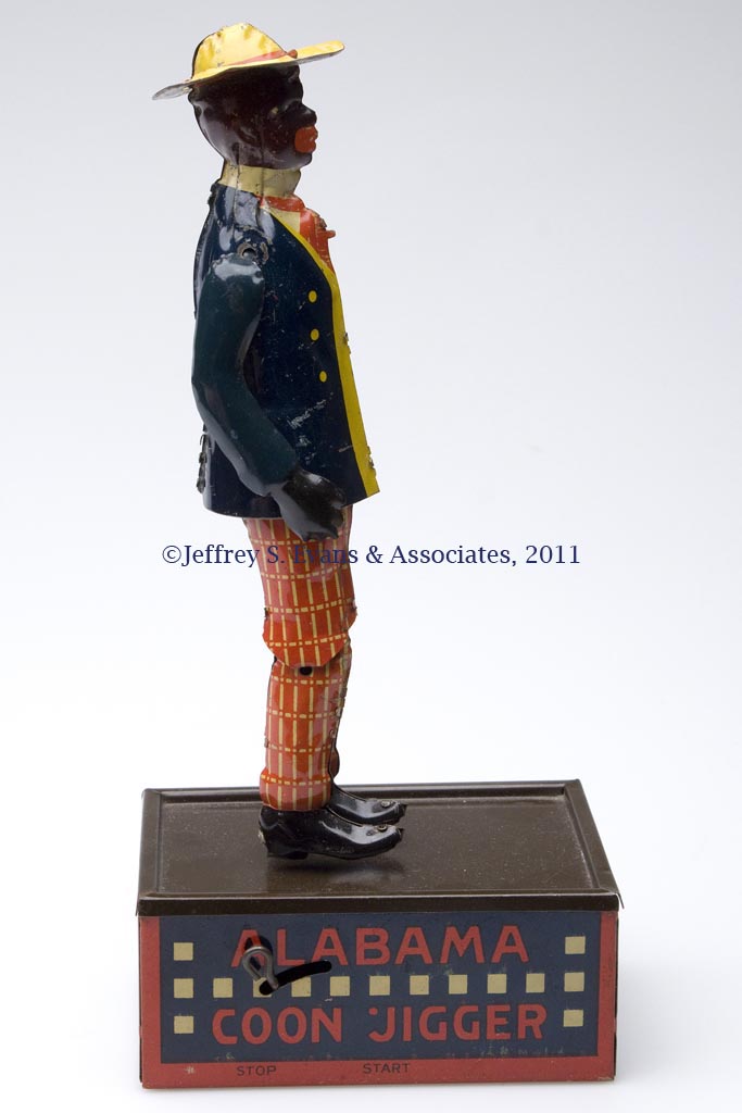 coon jigger wind up toy