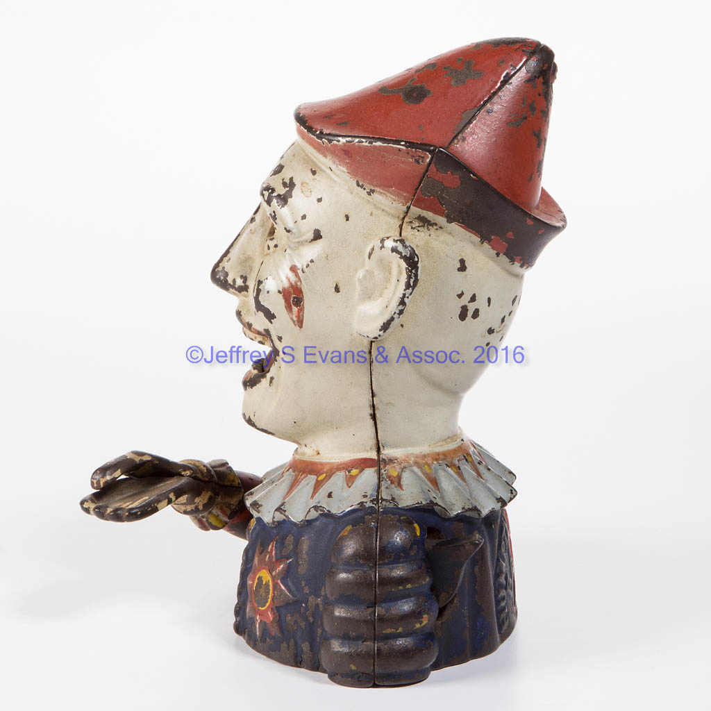 HUMPTY DUMPTY CASTIRON MECHANICAL BANK Jeffrey S. Evans & Associates