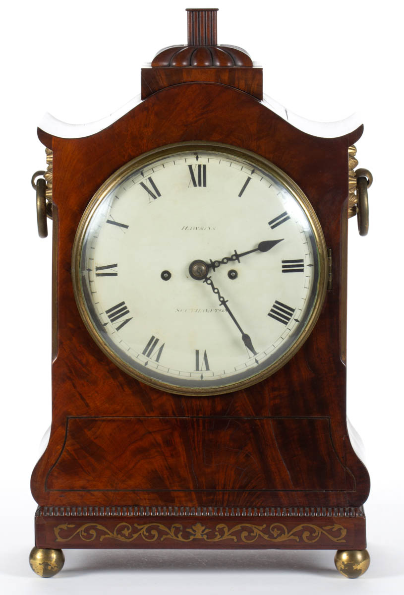 ENGLISH REGENCY MAHOGANY AND BRASS-INLAID BRACKET CLOCK