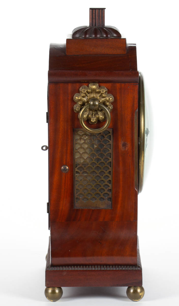 ENGLISH REGENCY MAHOGANY AND BRASS-INLAID BRACKET CLOCK